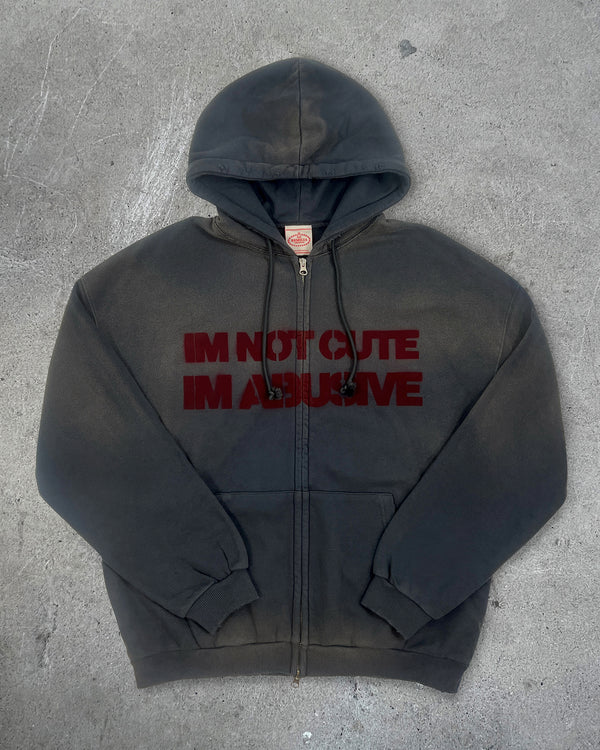 Front view of I'M NOT CUTE I'M ABUSIVE — Zip Hoodie | Heavyweight French Terry in faded black