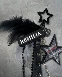 Accessory view of REMILIA CORPORATION — Feather and Stars Keychain | Full Grain Leather REMILIA tag