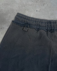 Detail view of belt loop on HIKIKKOMORI SWEATPANTS — Heavyweight French Terry in faded black