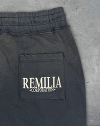 Detail view of back pocket on HIKIKKOMORI SWEATPANTS — Heavyweight French Terry in faded black