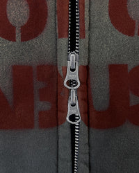 Detail view of YKK double zipper on I'M NOT CUTE I'M ABUSIVE — Zip Hoodie | Heavyweight French Terry in faded black