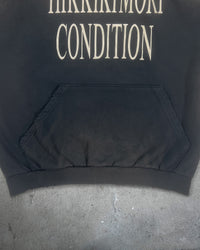 Detail view of distressed ribbing on HIKIKKOMORI CONDITION — Hoodie | Heavyweight French Terry in faded black