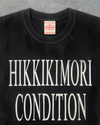 Detail view of slogan on HIKKIKIMORI CONDITION — T-Shirt | Heavyweight Cotton in distressed black