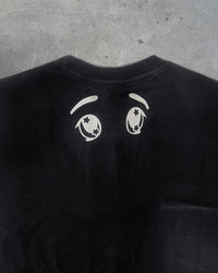 Detail view of back logo on HIKKIKIMORI CONDITION — T-Shirt | Heavyweight Cotton in distressed black
