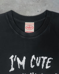 Detail view of tag on I'M CUTE I'M PUNK ROCK — T-Shirt | Heavyweight Cotton in distressed black