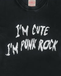 Detail view of slogan on I'M CUTE I'M PUNK ROCK — T-Shirt | Heavyweight Cotton in distressed black
