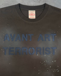 Detail view of slogan on Front view of AVANT ART TERRORIST — T-Shirt | Combed Cotton in faded black