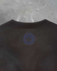 Detail view of back logo on AVANT ART TERRORIST — T-Shirt | Combed Cotton in faded black