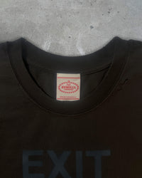 Detail view of tag on EXIT SOCIETY 100% NEET GOD — Double-Layer L/S Cut Sewn in faded black