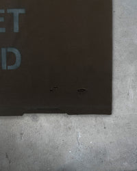 Detail view of hem distressing on EXIT SOCIETY 100% NEET GOD — Double-Layer L/S Cut Sewn in faded black