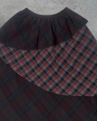 Detail view of waistband on SCHIZO TARTAN SKIRT — Asymmetrical Layered Skirt | Washed Cotton in red tartan.