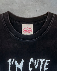 Detail view of tag on I'M CUTE I'M PUNK ROCK — Crop T-Shirt | Heavyweight Cotton in distressed black