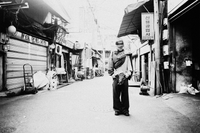 On-model styled view (male) of HIKIKKOMORI SWEATPANTS — Heavyweight French Terry in faded black