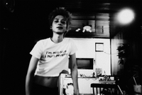 On-model front view (male) of slogan on I'M NOT NICE I HURT PEOPLE — Baby Tee in vintage white