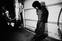 On-model style view (male) of EXIT SOCIETY 100% NEET GOD — Double-Layer L/S Cut Sewn in faded black